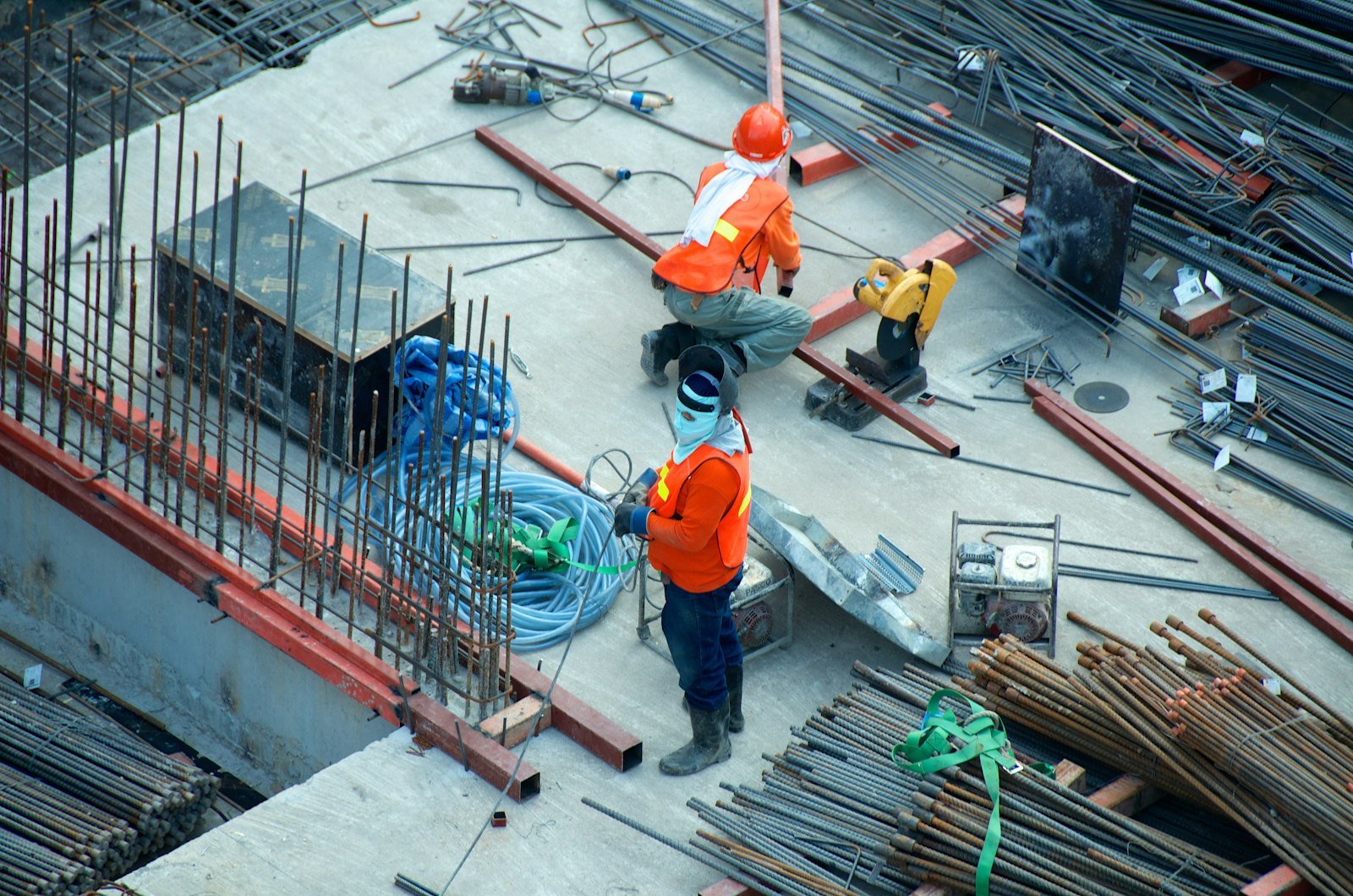 Crew placing reinforcement on an elevated deck, documented in the weekly photo log
